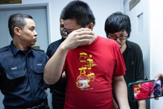 Two Friends Charged with Treason After Firebombing Multiple Homes in Perak