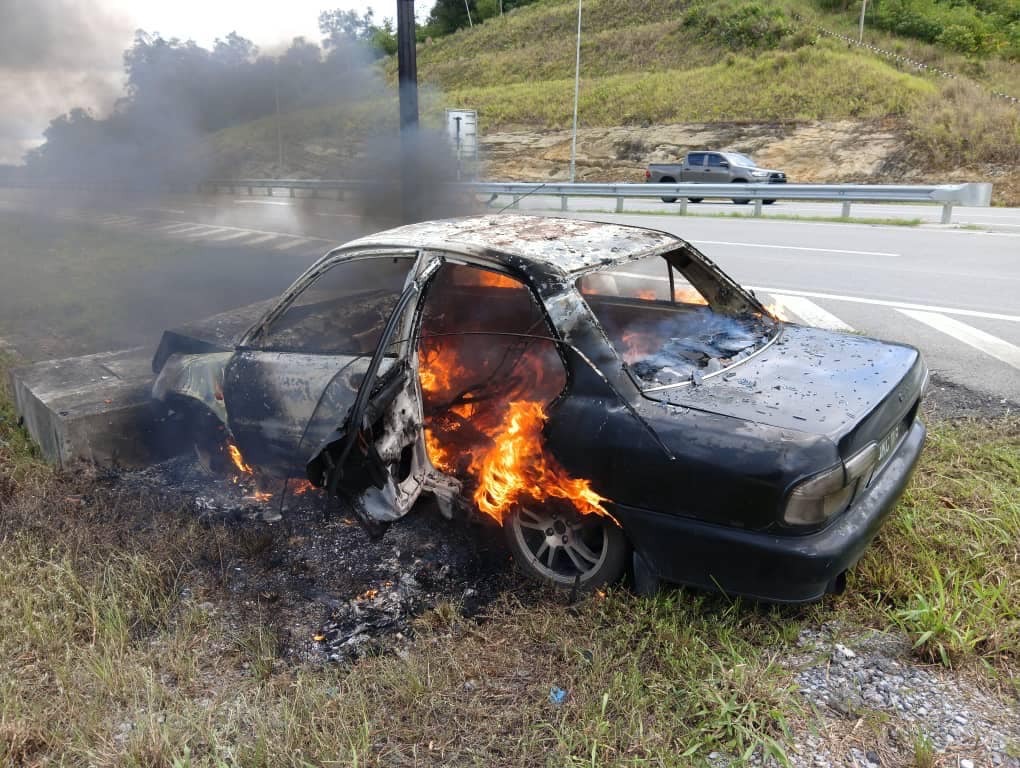 Narrow Escape: Man and Boy Survive Fiery Car Crash in Kampung Singai 4 Narrow Escape Man and Boy Survive Fiery Car Crash in Kampung Singai