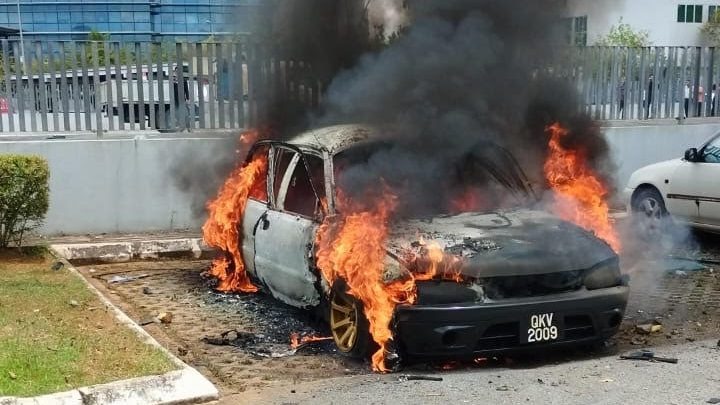 Car Catches Fire in Kuching Parking Lot, No Injuries Reported