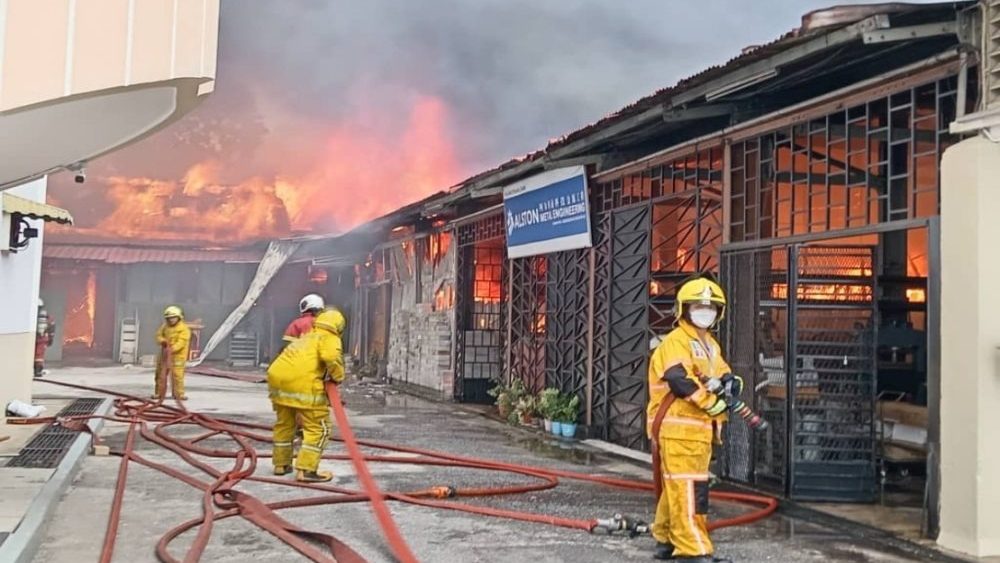 Firefighters Brave Danger to Contain George Town Factory Fire