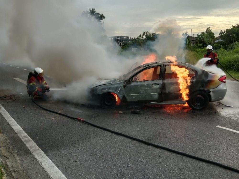 Husband and Wife Injured as Car Skids and Catches Fire in Miri