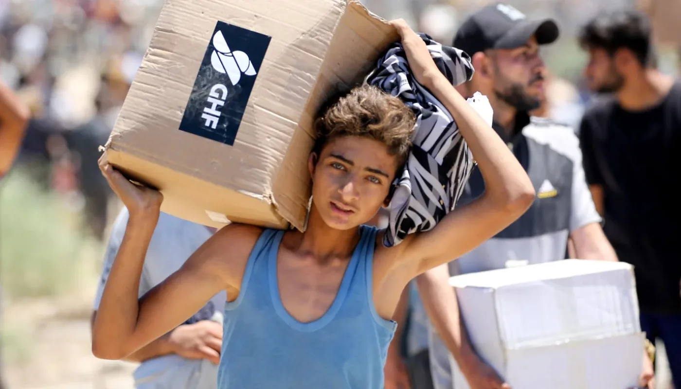 Israeli Strikes Kill Over 70 in Gaza Amid 'Dehumanizing' Aid Chaos